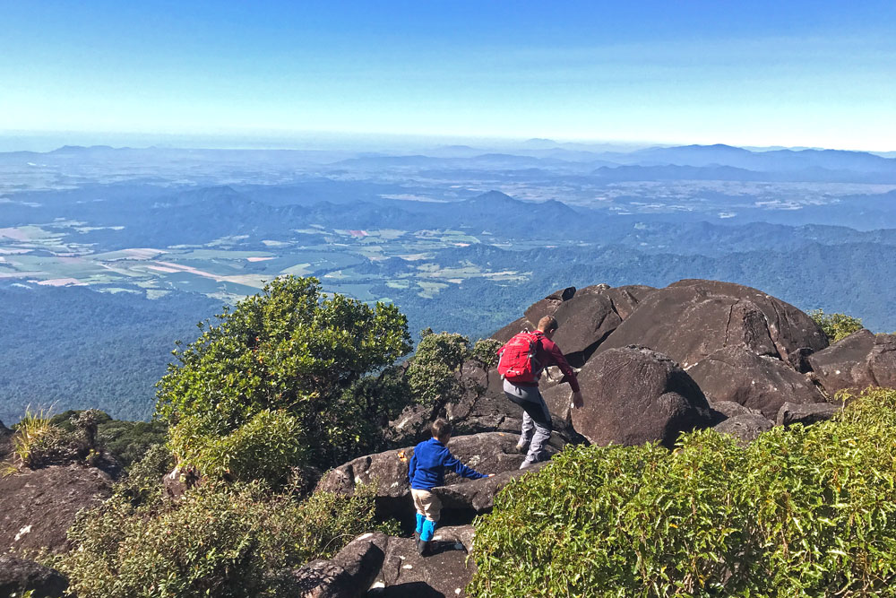 Crossing the boulder field before the summit of Mount Bartle Frere.